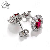 Oval Cut Lab Ruby 1CT Floral Stud Earrings