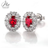 Oval Cut Lab Ruby 1CT Floral Stud Earrings
