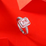 Lustrous Emerald Cut Moissanite Halo Pavé-Accented Ring
