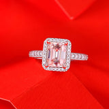 Lustrous Emerald Cut Moissanite Halo Pavé-Accented Ring