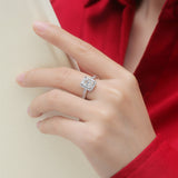 Lustrous Emerald Cut Moissanite Halo Pavé-Accented Ring