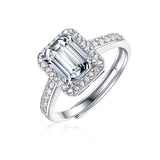 Lustrous Emerald Cut Moissanite Halo Pavé-Accented Ring