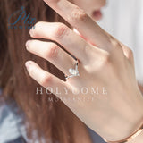 Curved Band Pear-Cut Moissanite Engagement Ring