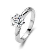 6 Prong Round Moissanite Twisted Pavé Ring