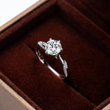 6 Prong Round Moissanite Twisted Pavé Ring