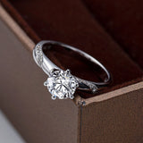 6 Prong Round Moissanite Twisted Pavé Ring